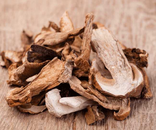 dried mushrooms on a cutting board