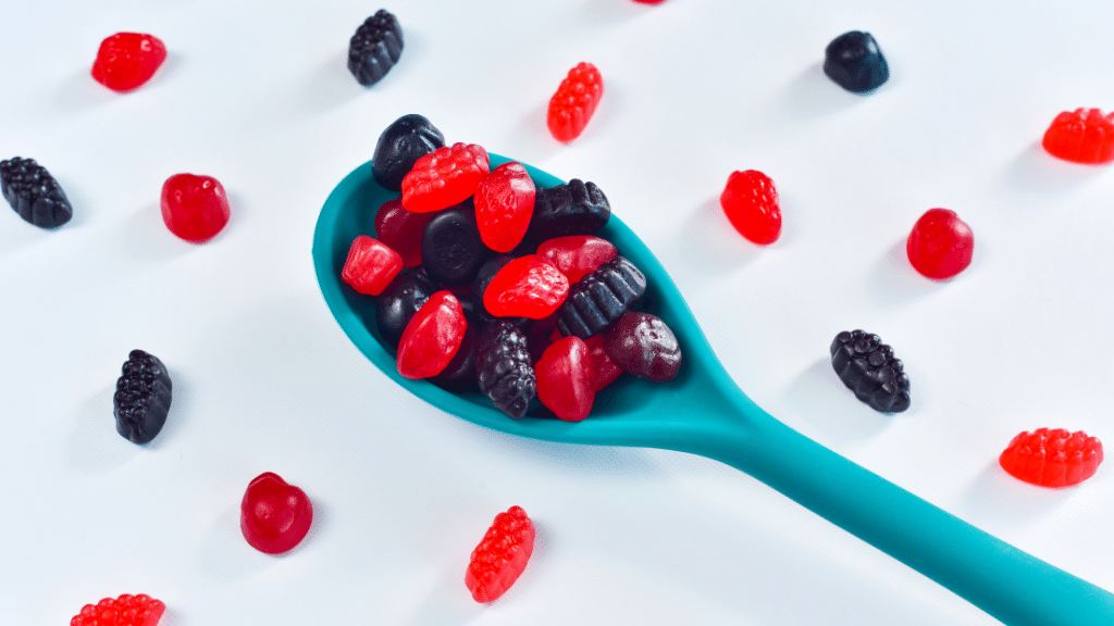 lions mane mushroom gummies on a spoon