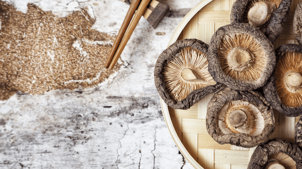 dried shiitake with chopsticks