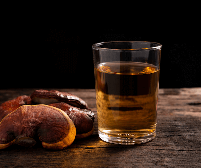 reishi mushroom tea in a glass