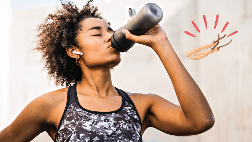 Woman taking cordyceps as a pre-workout