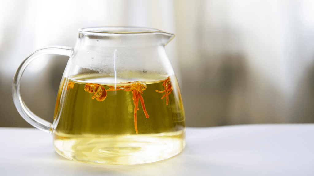Cordyceps tea in a glass carafe 